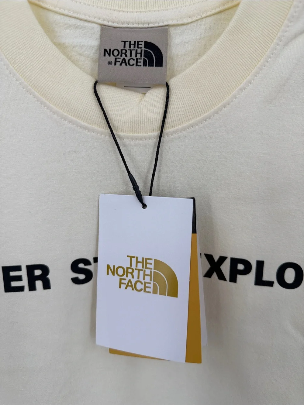 The North Face Cream Graphic 'Never Stop Exploring' Tee